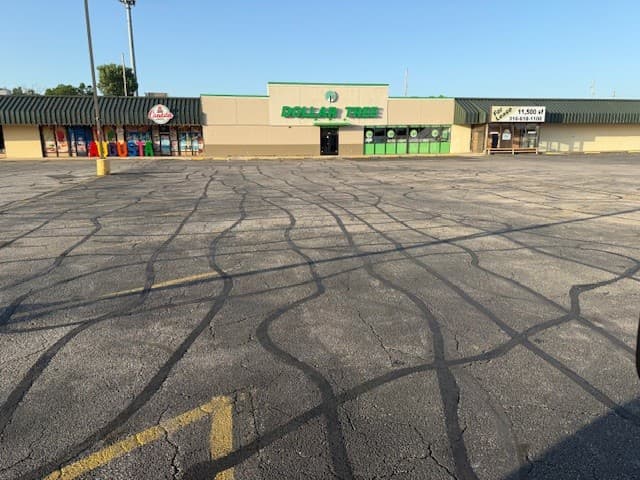 Sealed asphalt surface with smooth finish