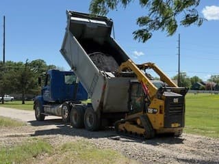 Asphalt & concrete paving crew at work