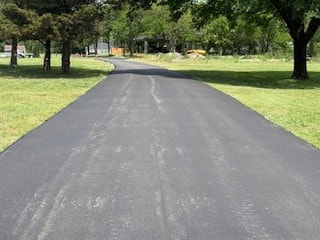 Asphalt paving crew with paver machine